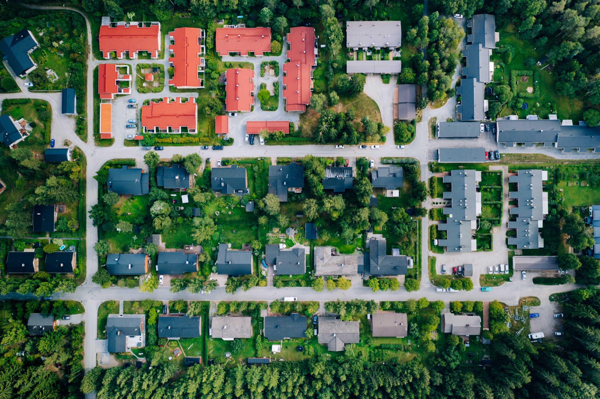 aerial view of suburban neighborhood roofs